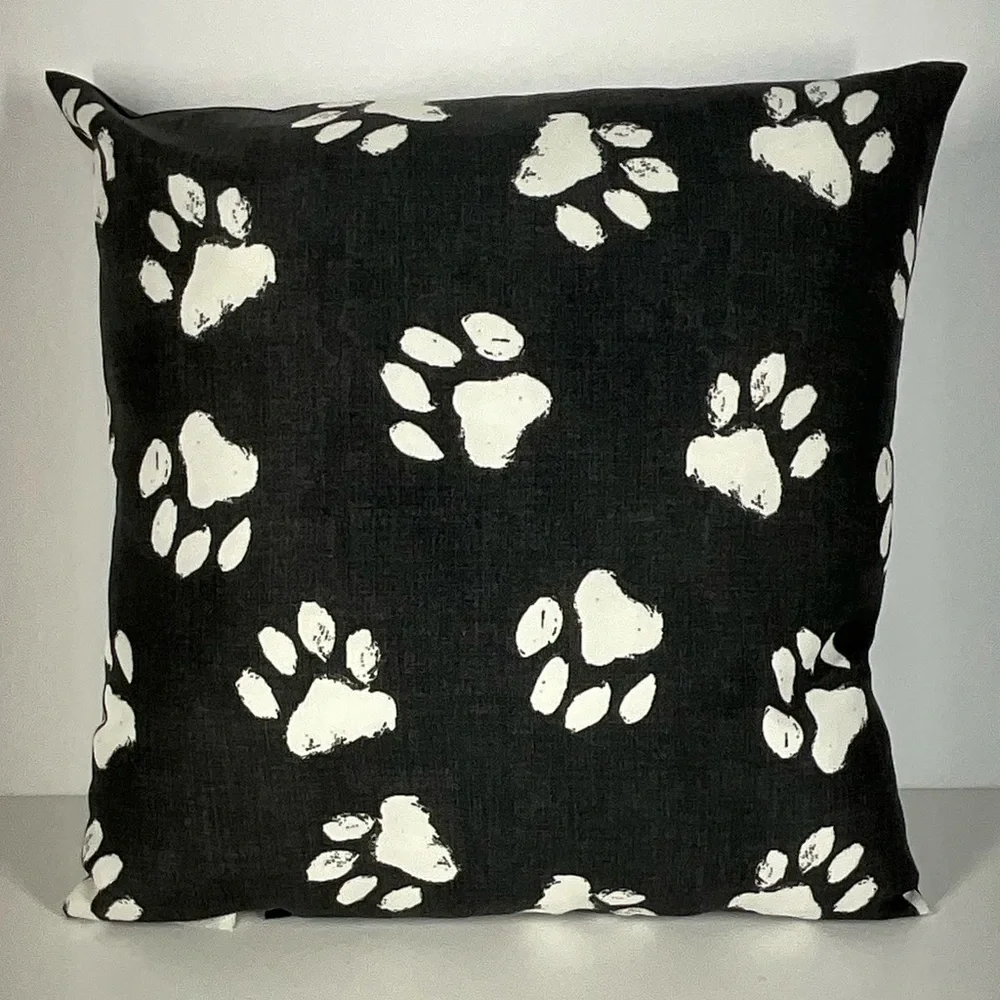 Mainstays Outdoor Black Pillow with White Paw Prints and Text‎ | 16 in. x 16 in.